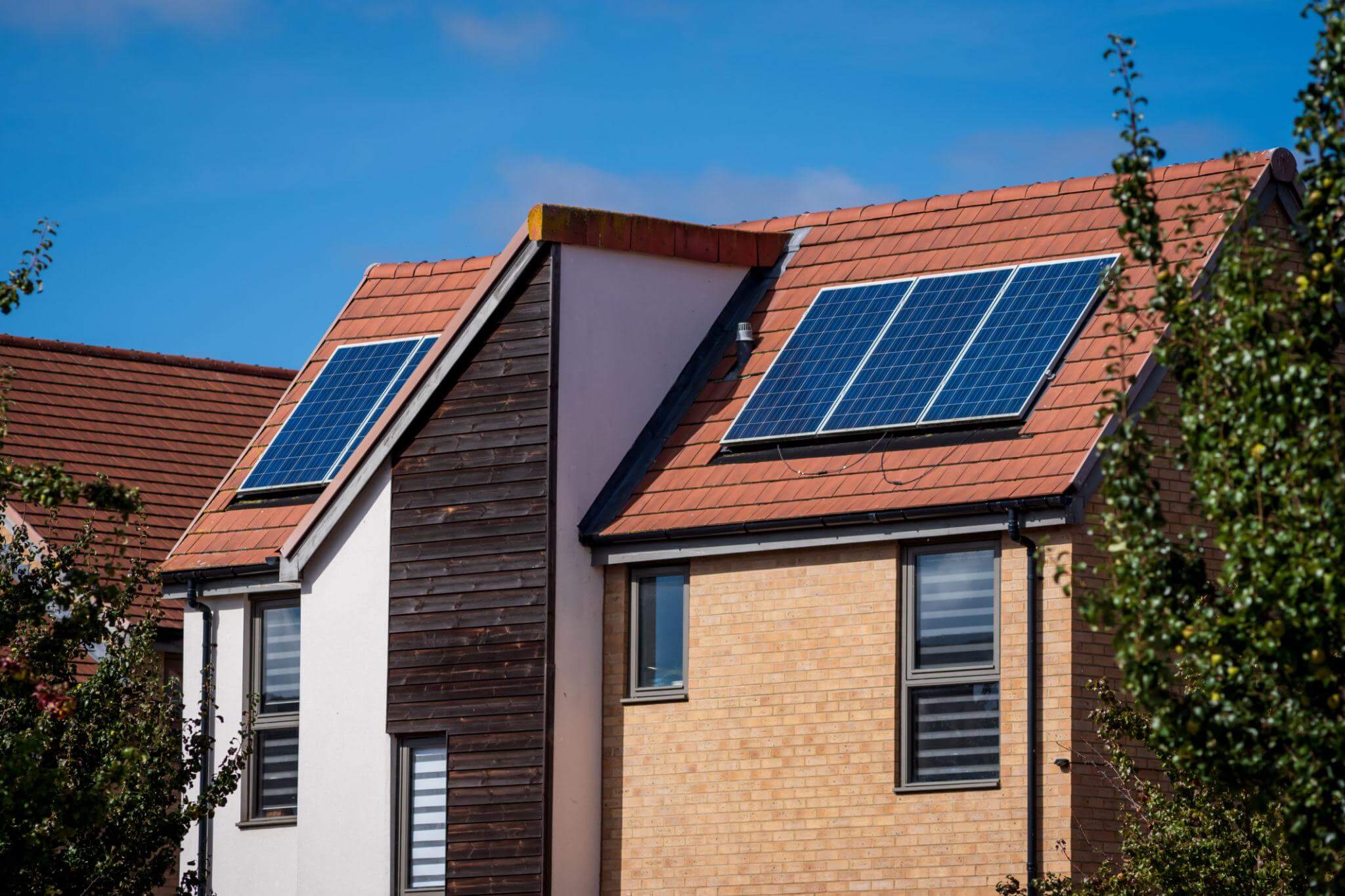 External shot of home with solar panels on the roof
