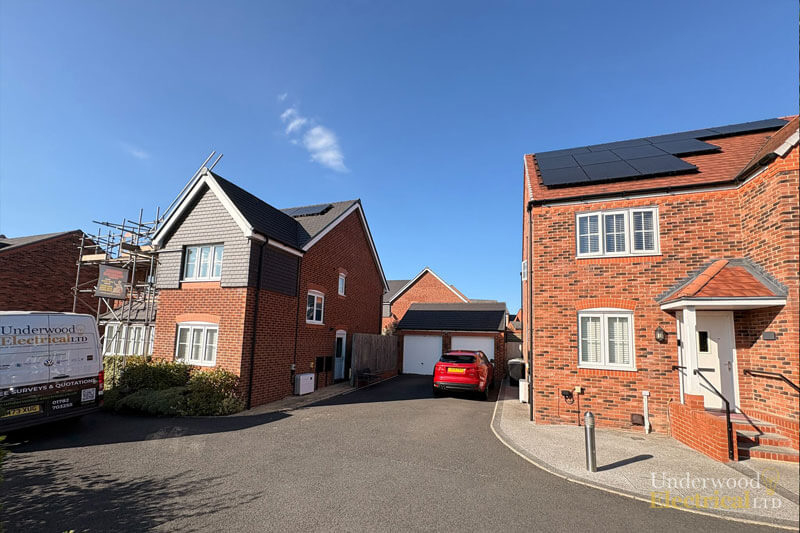 External shot of home with solar panels on the roof with Underwood Electrical Van